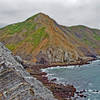 Looking towards Pedro Point Headlands. The grade line for a train that went around the headlands is still visible. The route was quickly abandoned because the land is too unstable to be maintained.