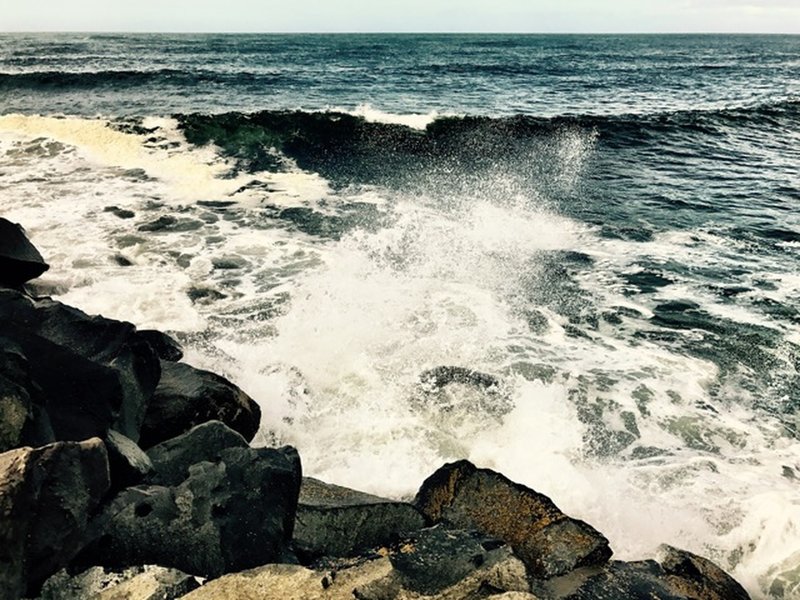 Waves crashing on the jetty, at Cape Disappointment State Park.