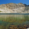 Lake 10918 below Emerald Peak. It is possible to scramble up the dark rock at the far end of the this lake to another lake above 11200 feet directly below the vertical cliffs of Emerald Peak.