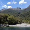 Glade Wharf - the starting point of the Milford Track with Dore Pass in the back