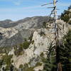 Cliffs on west side of Islip Ridge with Mt. Williamson in background.