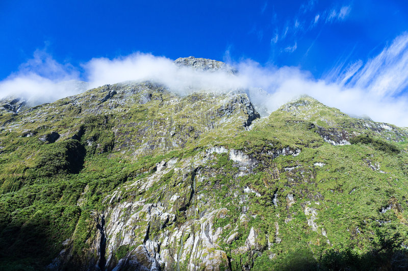 Morning clouds hovering around the top of the mountains