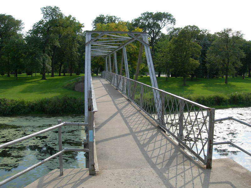 The blue blaze on the trail bridge heading south from Main St. to City Park