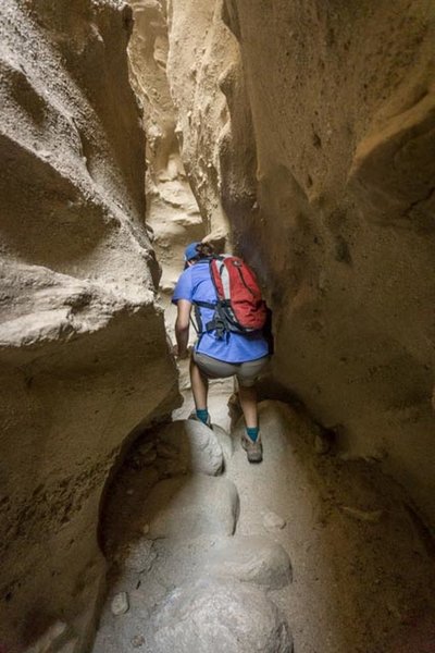 Stepping down into the slot canyon