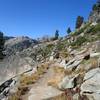 Climbing past the granite cliffs