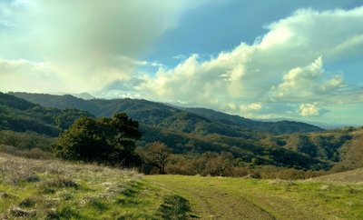 The Santa Cruz Mountains and Mt. Umunhum in the distance (left of center), from the high point of Serpentine Loop Trail, looking west