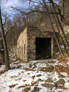 The old stone train shed on the trail towards the Ledge Quarry.