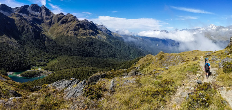 Panorama from the Routeburn Track with Lake Mackenzie to the left and the clouds moving into the Hollyford Valley to the right