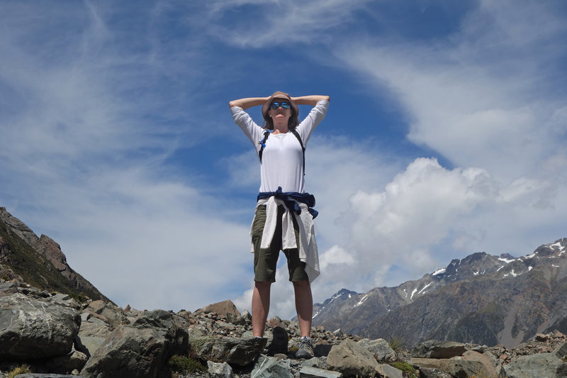 Hiker at the end of the Hooker Valley Track