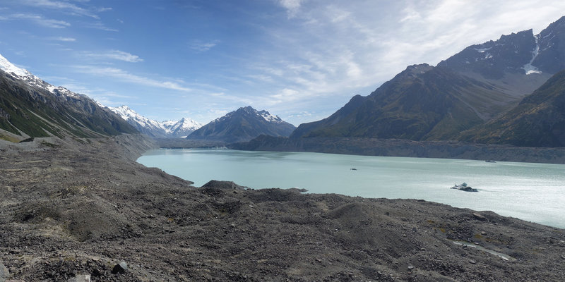 120 degree panorama of Tasman Lake centered on the Malta Brun Range. Left to right: snowcapped edge of Mt. Cook, Mt. Haidinger, Graham Saddle, De La Berche, Mt. Johnson (center bump), the Armchair, and Mt. Bretta