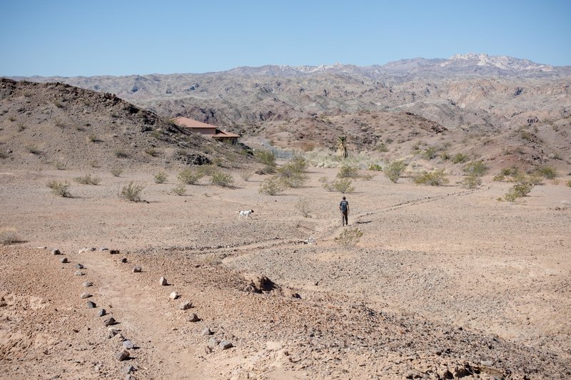 Near the beginning of the trail before the Ranger substation. You enter the hills and dunes past this point.