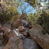 Climb up following the basin.