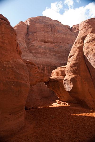 Sand Dune Arch is named for the deep sand you'll walk through to get to and under it.