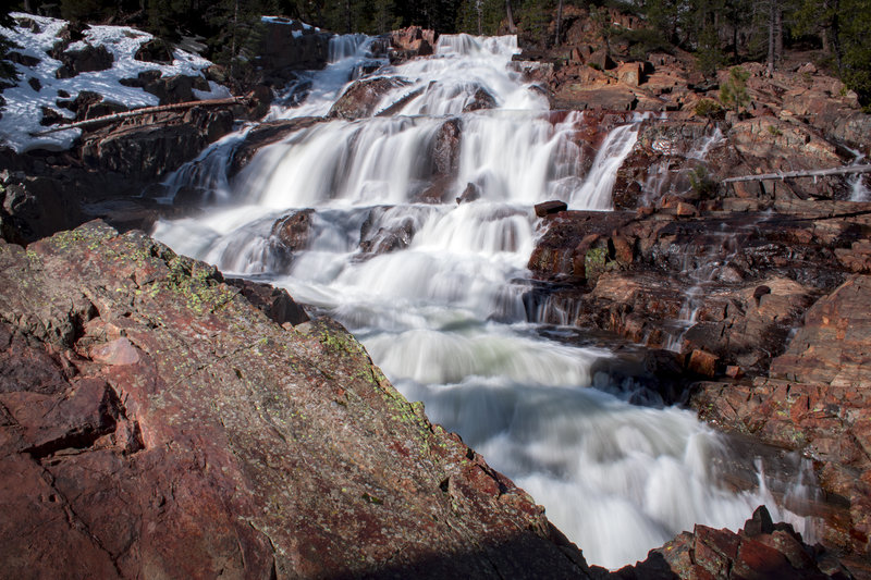 Lower Glen Alpine Falls early morning, just off the road before the trailhead. Popular tourist spot.