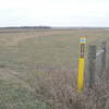 The NCT is marked with these yellow Carsonite posts.The canal is seen in the distance.