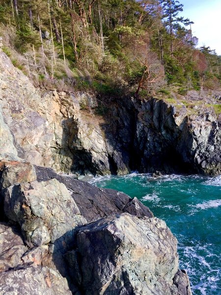 Looking south towards a little, rocky, inlet.