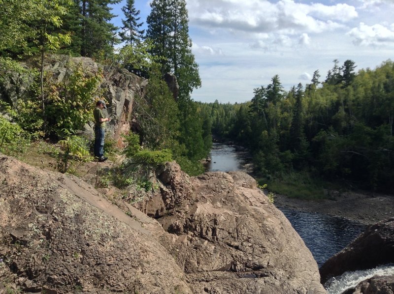 Standing at the High Falls on the Superior Hiking Trail on a sun-drenched rocky outcropping - facing South toward the mouth of the Baptism River in September, 2013.