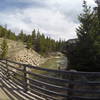 Start of the trail by a bridge crossing the Dearborn River.