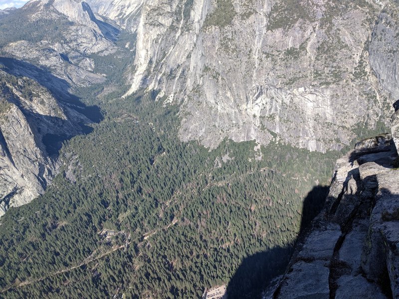 Looking down at the valley floor, parking lot below for reference