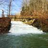 Suspension bridge over spillway