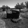 Abandoned car body near homestead