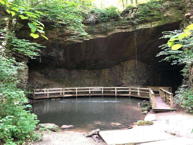 Marble Mine - small cave of marble, with a spring and a small waterfall filling in a small pool of water.