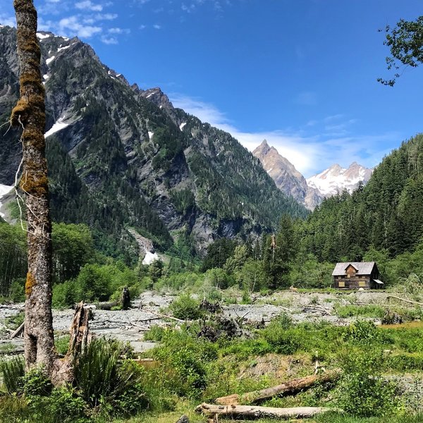 Walking into Enchanted Valley with the Chalet in view.