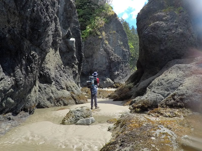 Standing between two sea stacks.