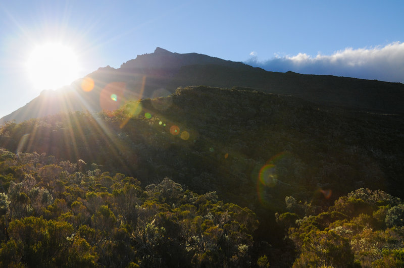 The sun begins to set behind Piton des Neiges in route to the Refuge