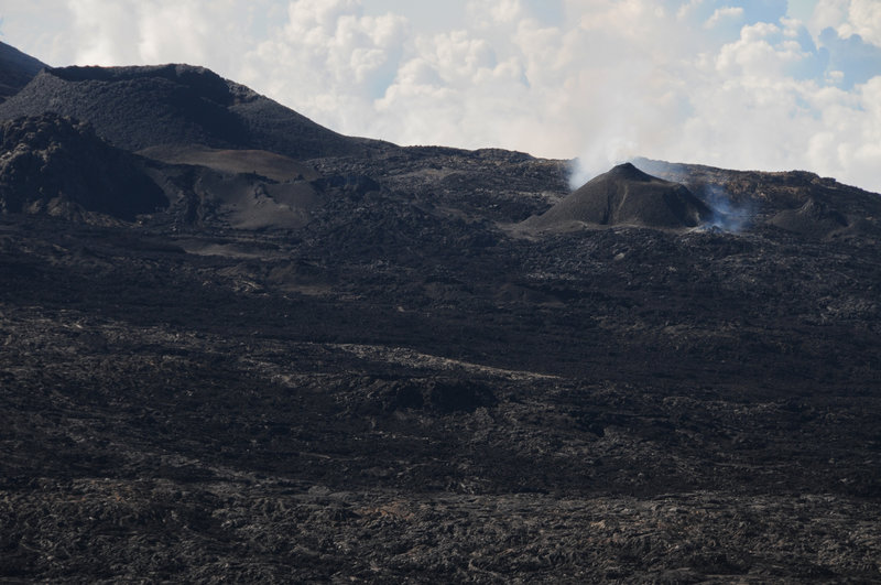 The 2018 eruption has formed a new spatter cone near a bunch of older cones.