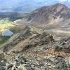 Nearing the summit of Father Dyer Peak looking down at lower crystal lake and the 3rd class ridge