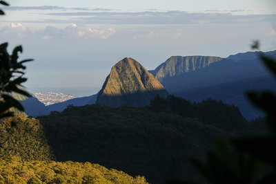 An early view over Cirque de Mafate to (L to R) Saint Denis, Piton Cabris, and Dos d'Ane
