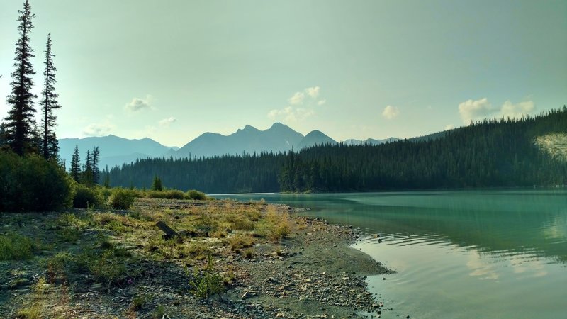 Early morning at Brazeau Lake, a large backcountry lake. This is the view looking southeast from the shoreline at Brazeau Lake Trail Camp.