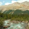 John-John Creek cascades downstream close to where it empties into Brazeau Lake, as seen looking northeast from Pobotkan Pass Trail at the John-John Creek crossing.