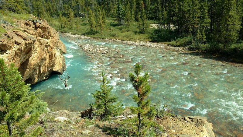 The Brazeau River runs below a rocky overlook on the South Boundary Trail.