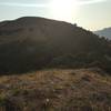 A view of the 4th crux. There is a trail that emerges from the forested section, then climbs straight up the hill.