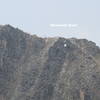 Mt Goat just below ridge and just above the X. This is view with no magnification from glacial lake at head of the trail, slowly feeding along the mountain for at least 20 minutes.