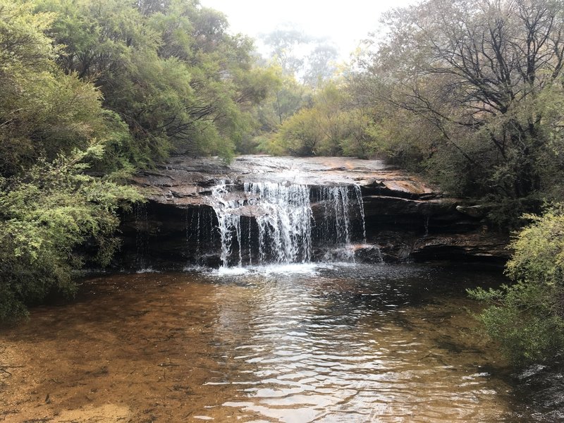 A small waterfall on the walk - has a nice sandy area to walk on.