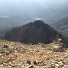 A cool rock formation just below the summit of Box Elder, with Tibble Fork Reservoir down below