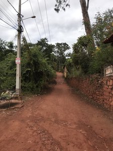 Paved road becomes dirt road