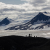 Hikers at the end of the trail, overlooking the ice field.