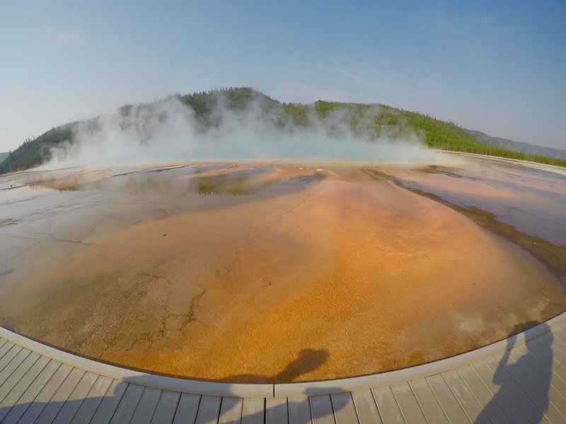 Turquoise steam rising off of the Grand Prismatic.