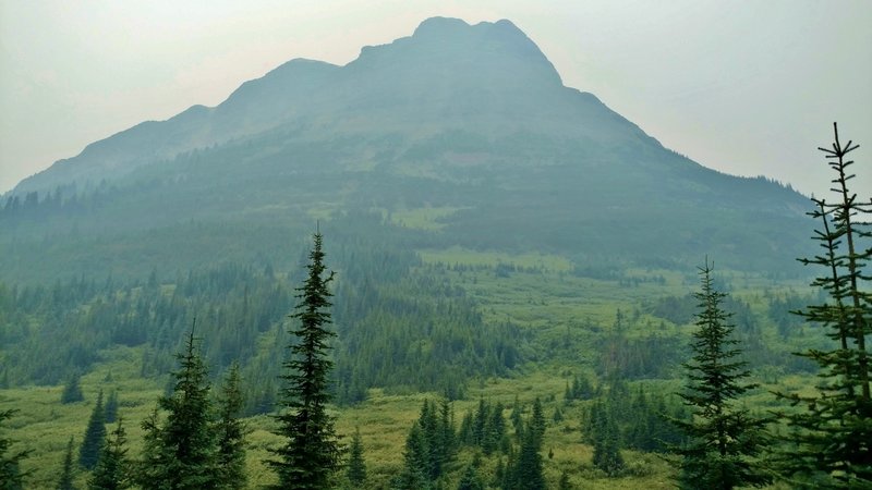 Tete Roche, the eastern-most peak of Yellowhead Mountain, as seen from the trail end on a hazy, overcast day.
