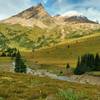 The headwaters of Calumet Creek flow down through the mountain meadows just west of Moose Pass. Seen looking west-northwest from the west side of Moose Pass.