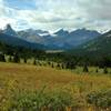 More mountains, glaciers, and snowfields come into view to the west-southwest when descending through the Moose Pass meadows. Mumm Peak, Mount Anne-Alice, Mural Glacier, Mount Phillips, and Gendarme Mountain (left ot right).