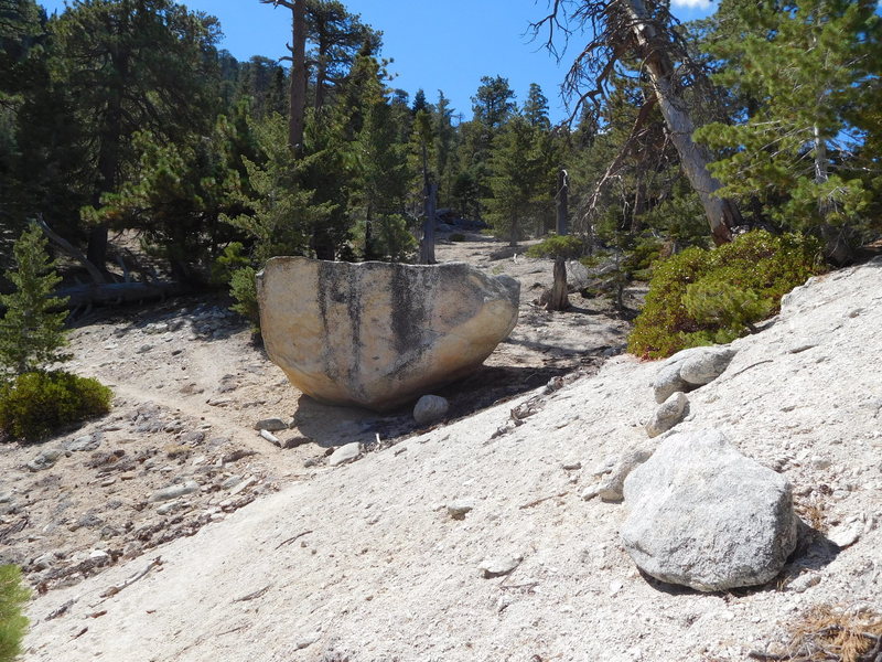 Upside-down boulder at start of steep climb to Twin Peaks.