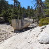 Upside-down boulder at start of steep climb to Twin Peaks.