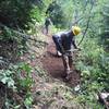 BMLT Blues Crew repairing the slope of the trail.