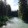 The Reynolds River flowing quickly at the end of June thanks to the snowmelt from the surrounding hills.