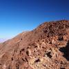 The trail gets steeper and rockier along the summit ridge